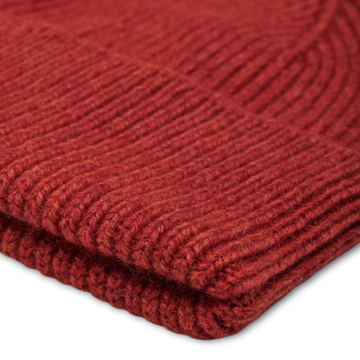 Maille du BONNET CLASSIQUE RUSSET en gros plan macro, tricotée par Robert Mackie of Scotland